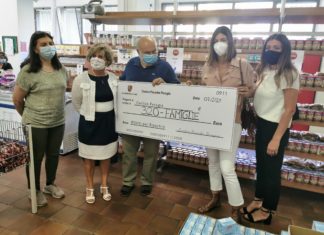 Uniti per ripartire: la donazione del centro Porsche di Perugia alla Caritas